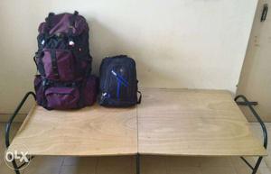 Purple Camping Bag And Black Backpack