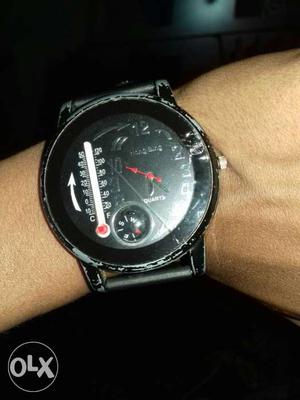 Round Black Chronograph Watch With Black Leather Strap With