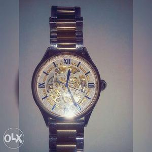 Round Gold And Silver Mechanical Watch With Gold And Silver
