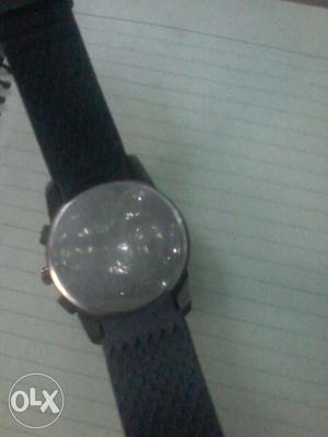 Round Silver And Black Watch With Black Band