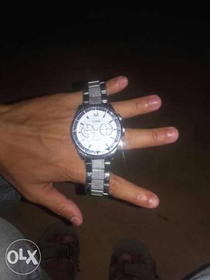 Round Silver Case White Chronograph Watch With Silver Link