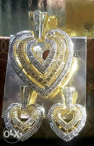 Three Silver And Gold Heart Pendants