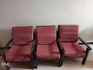 A set of three authentic solid wooden chairs