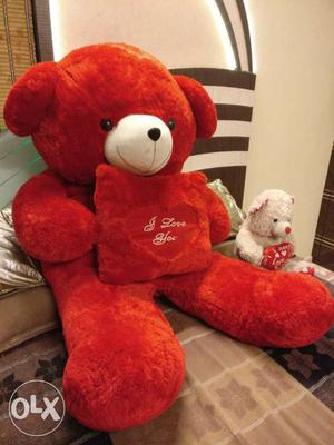 Attractive Red puffy Teddy Bear 5 feet and heavy in weight.