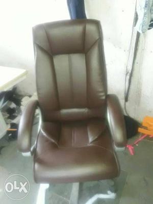 Brown Leather Rolling Armchair
