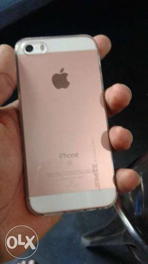 Iphone SE rose gold billed on gb finger