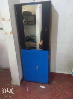 Black And Blue Wooden Cabinet With Mirror
