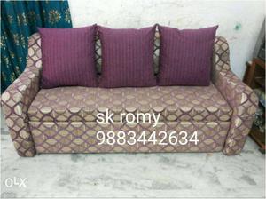Brown And Purple Sofa Chair With Purple Throw Pillows