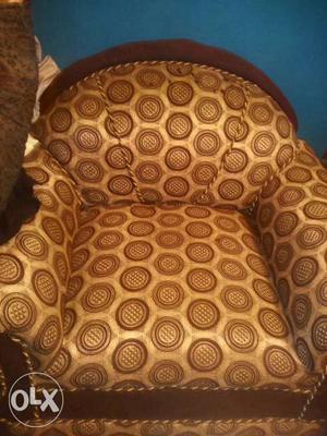 Brown Padded Armchair
