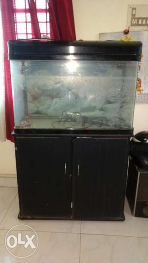 Fish tank for sale. With cupboard and motor