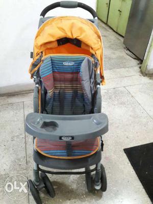 Graco brand pram/stroller. 1 year old unused condition.