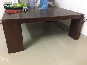 Low teak coffee table. simple and elegant.