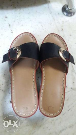 Pair Of Black-and-brown Leather Slide Sandals