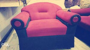 Red sofa in good condition price negotiable.