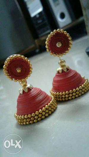 Red with golden handmade quilling jhumkas can be