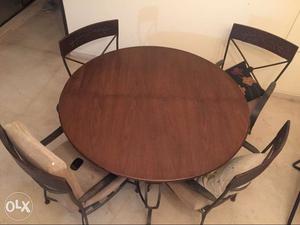 Round Brown Wooden Table And Chairs Set (Not Negotiable)