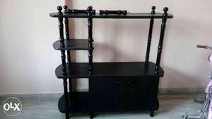 TV cabinet with foldable self adjustment.