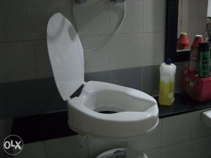 Toilet raiser for senior citizens