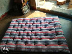 Tufted Gray And Red Mattress