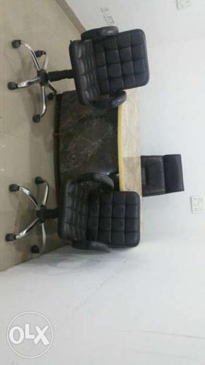 Two Black Leather Rolling Armchairs