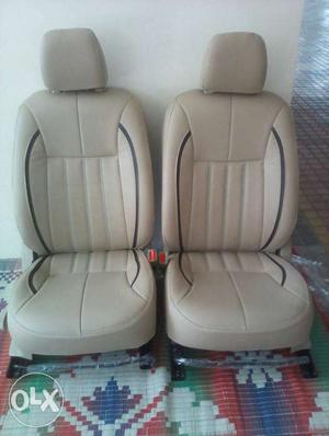 Two Brown Leather Car Seats
