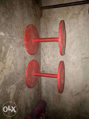 Two Red Metal Stands