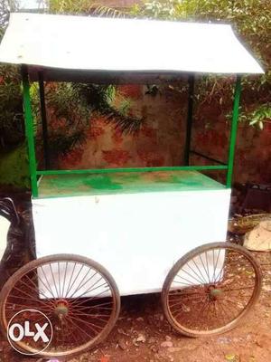 White And Green Rolling Kiosk