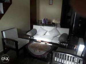 Wooden sofa 5 seater.( year old.in good