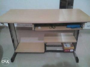 8 month old, very good condition computer table.