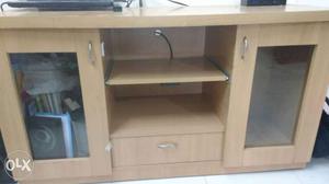 A TV unit in condition made with lots of compartments.