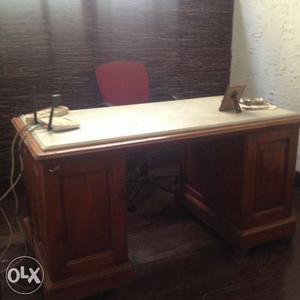 A genuine antique office table with concealed