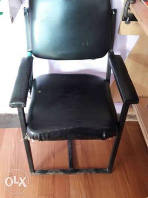 Black Leather Padded Armchair With Black Metal Base