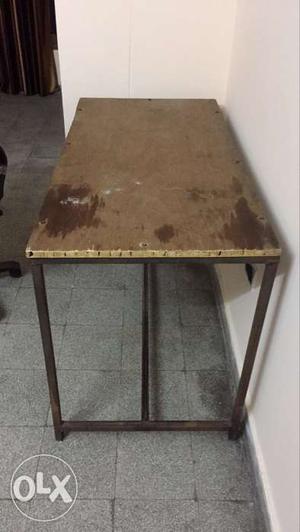 Black Metal Base Rectangular Brown Wooden Table