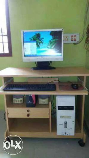 Desktop Computer And Beige Wooden Computer Desk