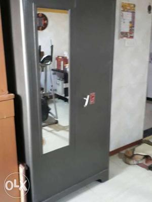 Gray Metal Armoire With Mirror