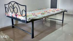 Iron channel single bed with head side design