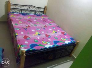 Its Quin size bed metal body with Wood work