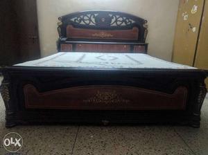 King size bed with good condition mattress.