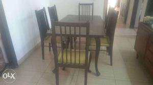 Pure teak wood dinning table with six chairs in