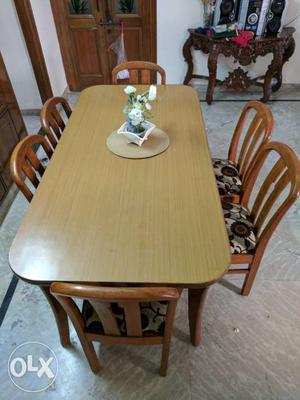 Teak wood dining table with chairs