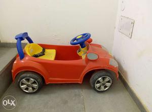 Toy car, 2 ft x 1 ft x 1 ft, for kids 1-3 years.