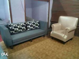 Two Gray And White Sofa And Sofa Chair