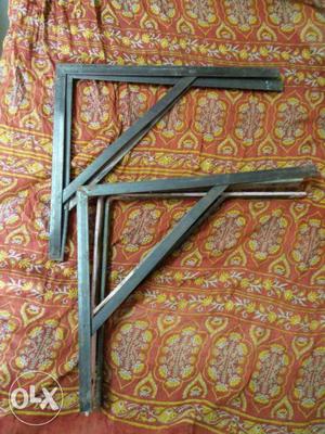 Two Gray Steel Shelf Frames