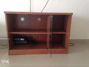 Zuari TV unit can fit " tv selling for -