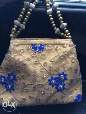 Brand new purse blue and golden colour just at 500