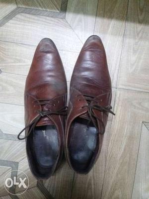 Brown leather shoes in perfect condition.