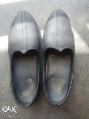 Pair Of Black Leather Clogs