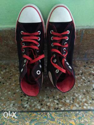 Pair Of Black-and-red Converse High Top Sneakers. Size: 8