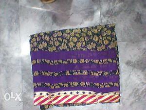 Purple And Brown Floral Textile