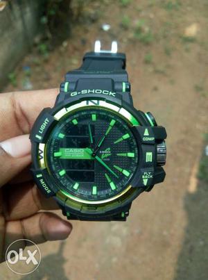 Round Black And Green G-Shock Digital Watch With Black Strap